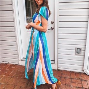 Shop Stevie small rainbow stripe wrap maxi dress